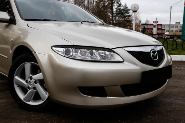 Накладки на передние фары Mazda 6 2002-2007 глянец (под покраску)