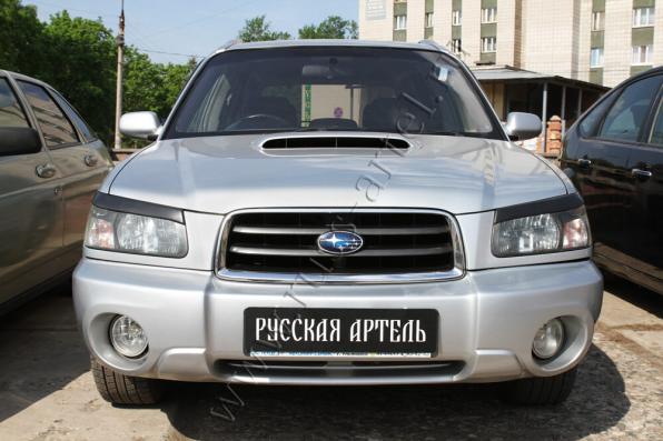 Накладки на передние фары Subaru Forester 2002-2005 глянец (под покраску)